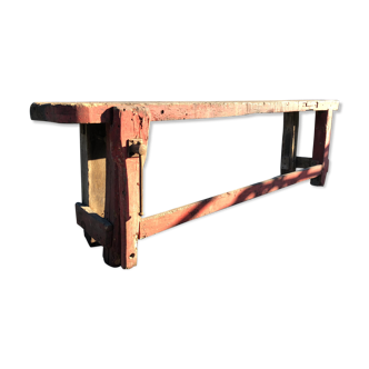 Old carpenter's workbench painted red