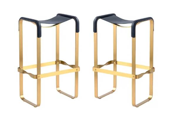 Pair of blue metal and brass stools without a backrest.
