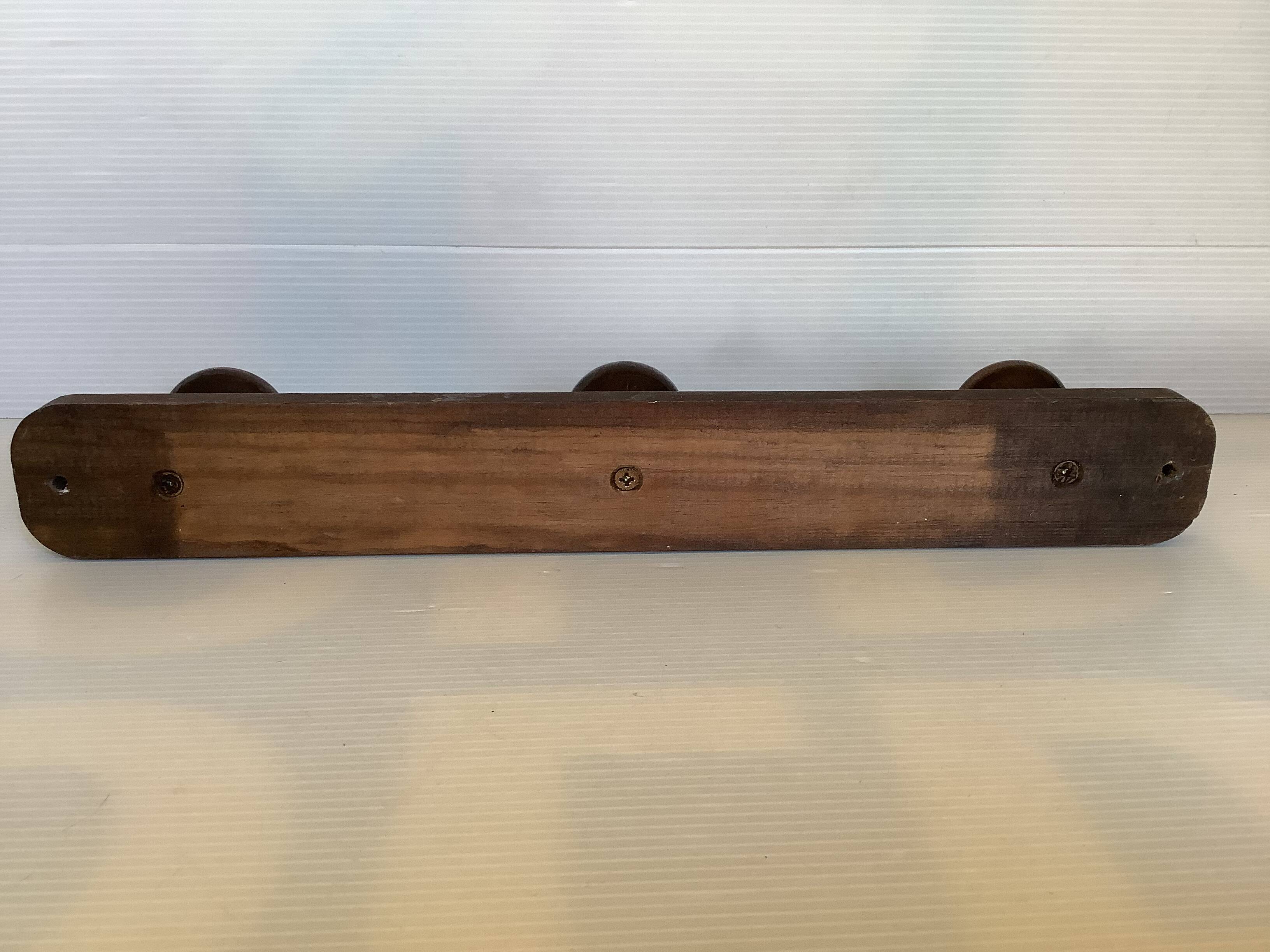 Dark wood coat rack