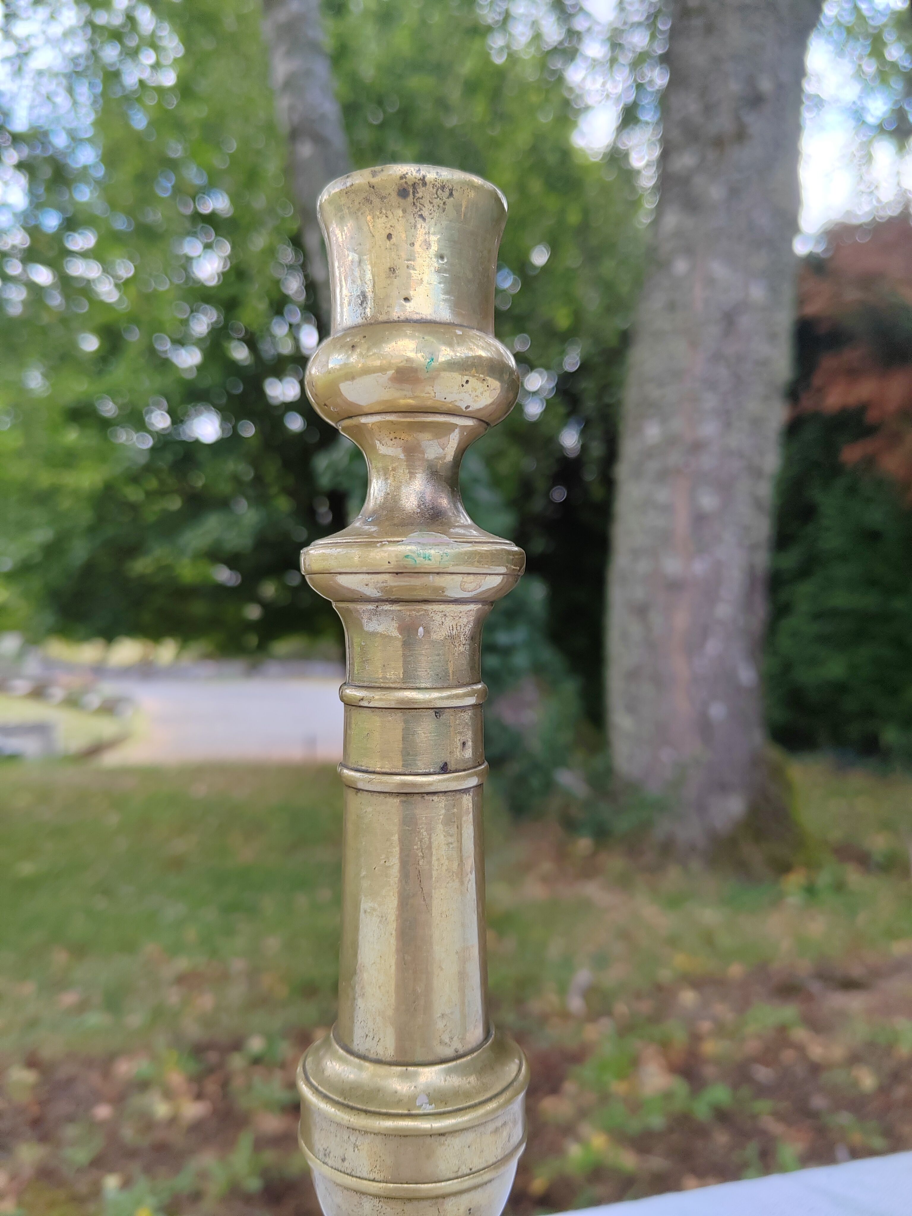 Golden brass candle holder