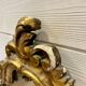 Vintage wall mirror in Louis XV / Baroque style – Carved wooden frame in gold.