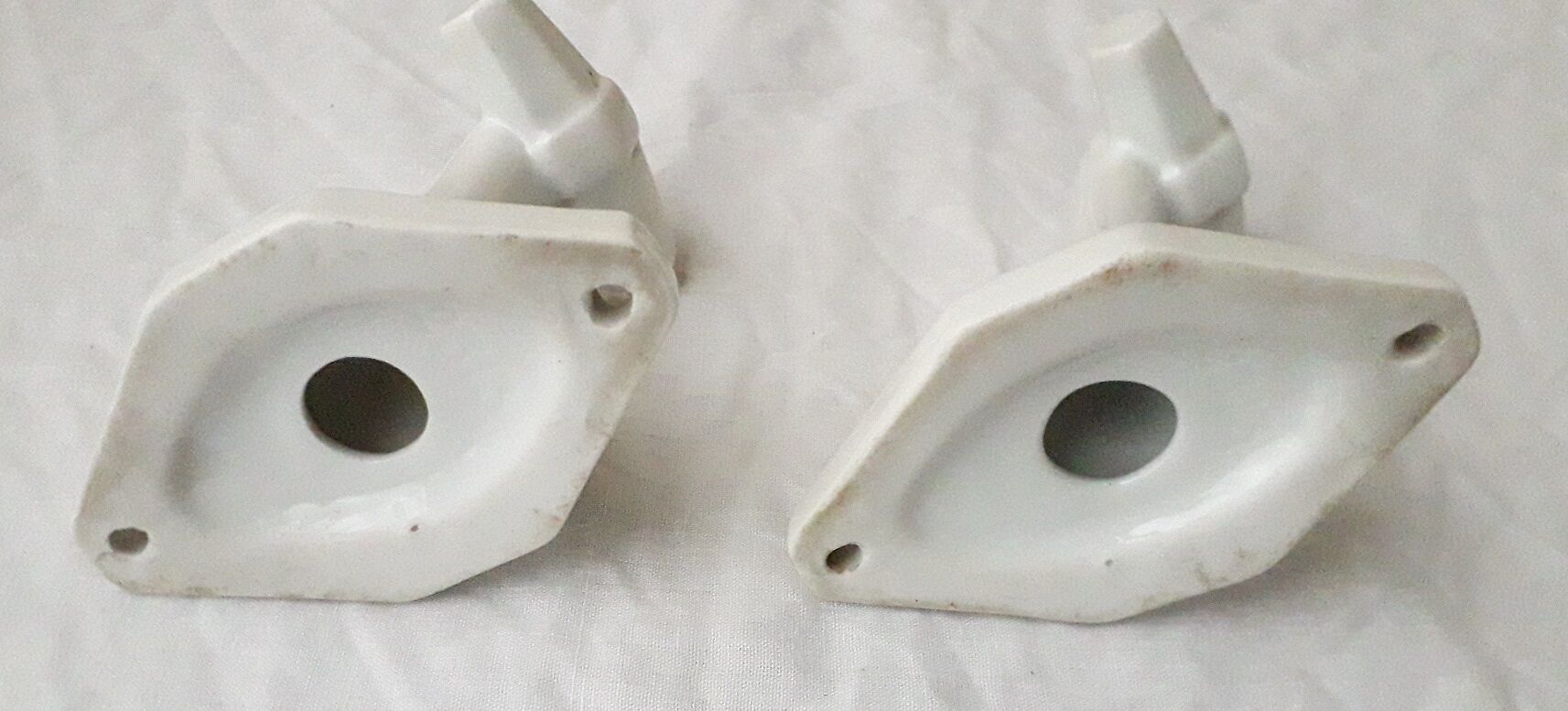 Pair of porcelain hooks