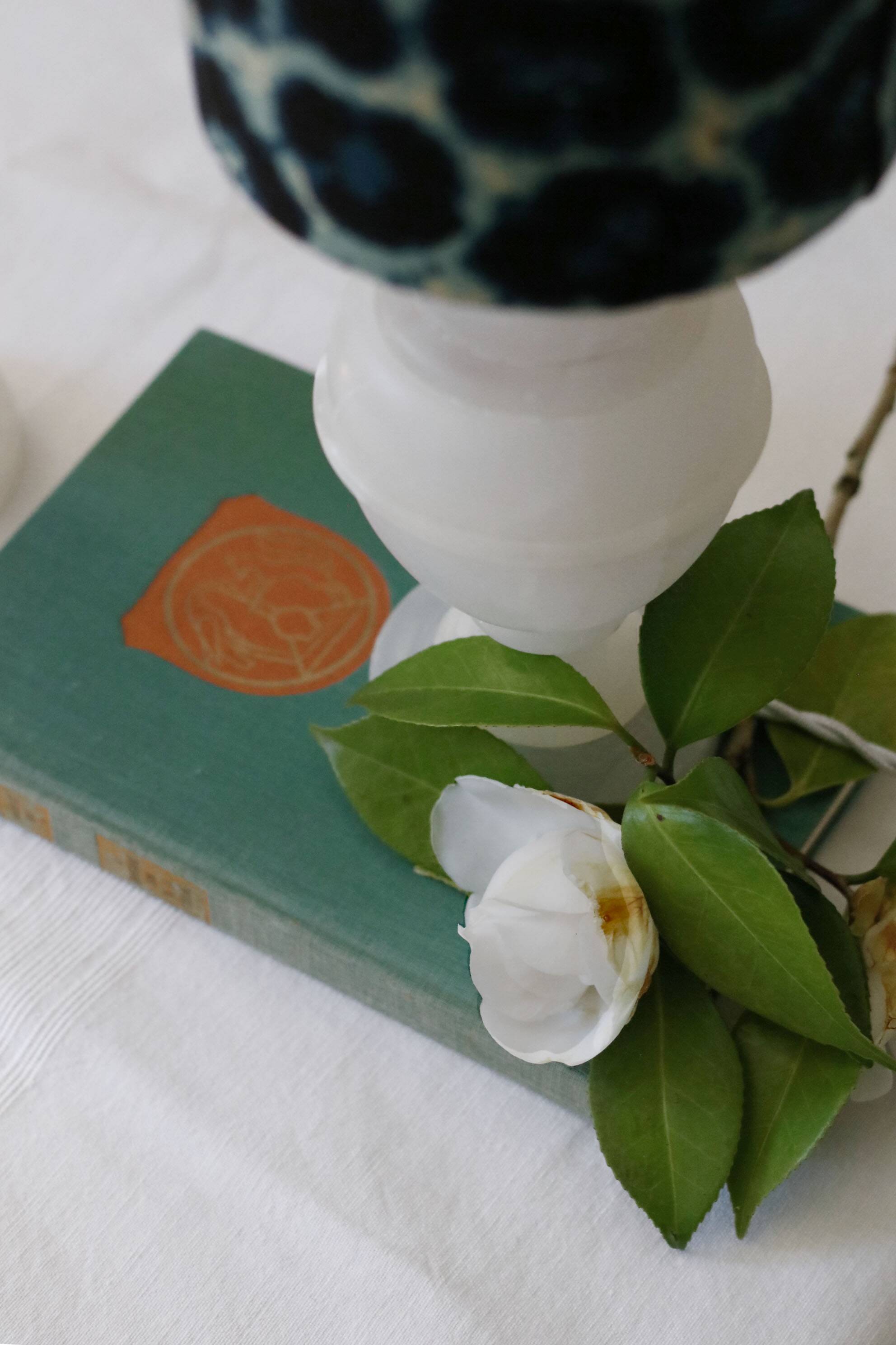 Pair of alabaster bedside lamps with blue leopard shades