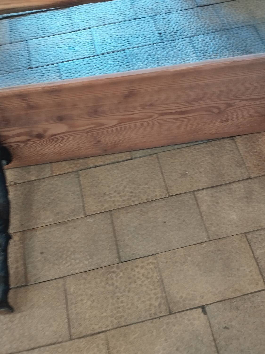 Antique garden bench with cast iron legs