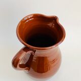Vintage pitcher in glazed earth