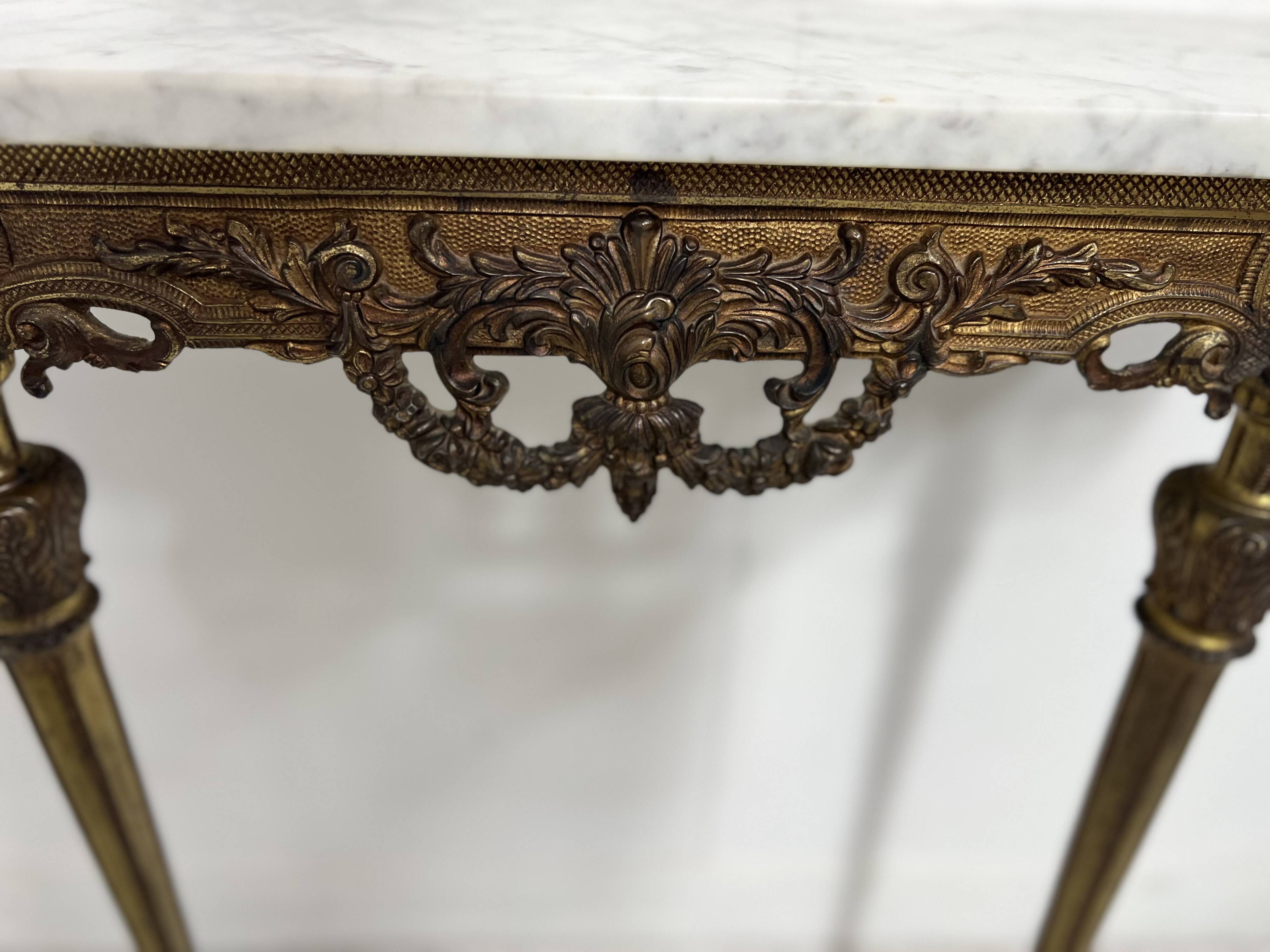 Louis XVI style console in gilded bronze, 20th century