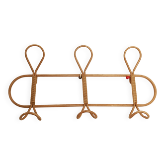 Wicker-look wall-mounted coat rack