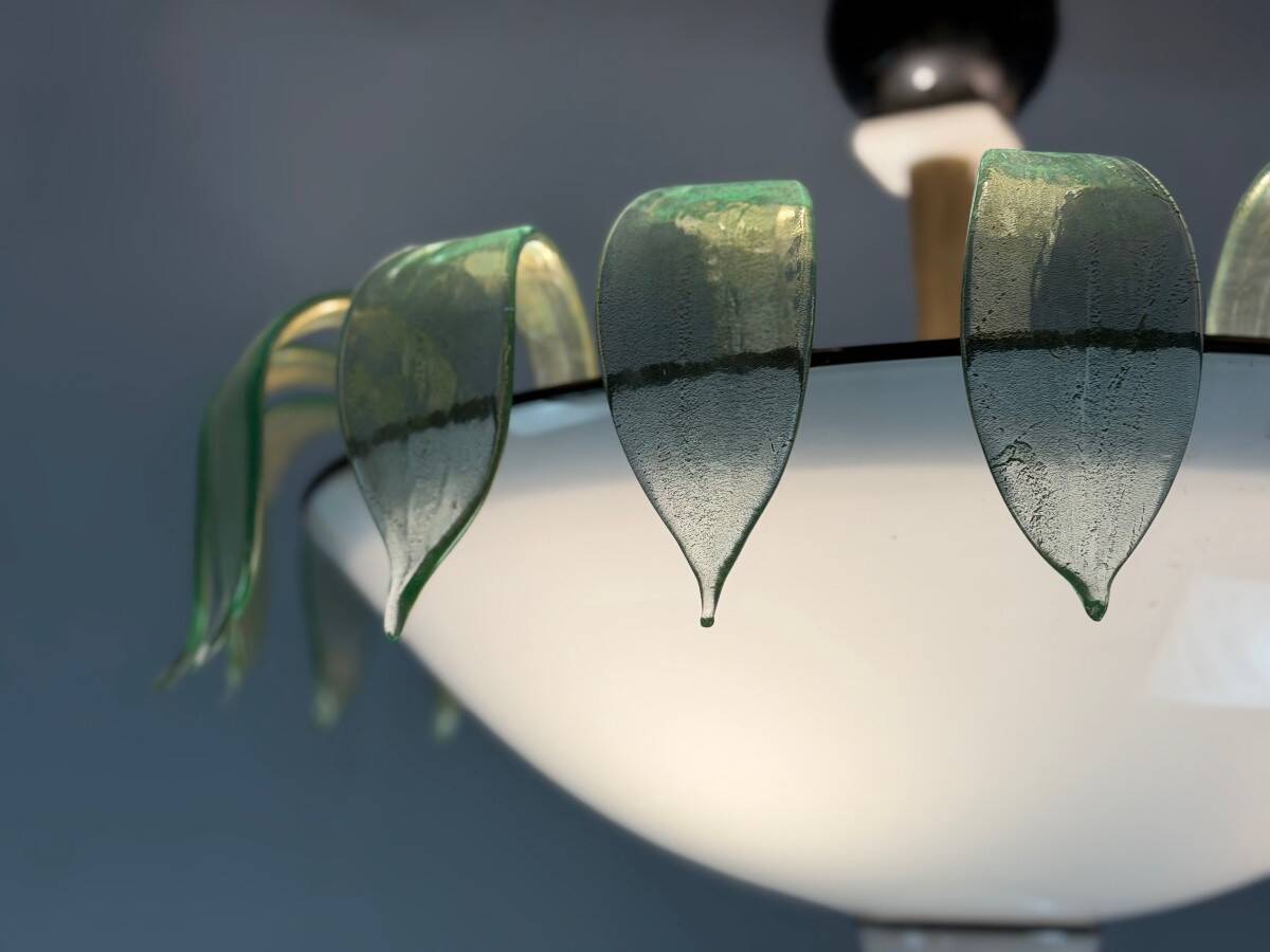 Venetian chandelier in white, black and green Murano glass sprinkled with gold, circa 1980