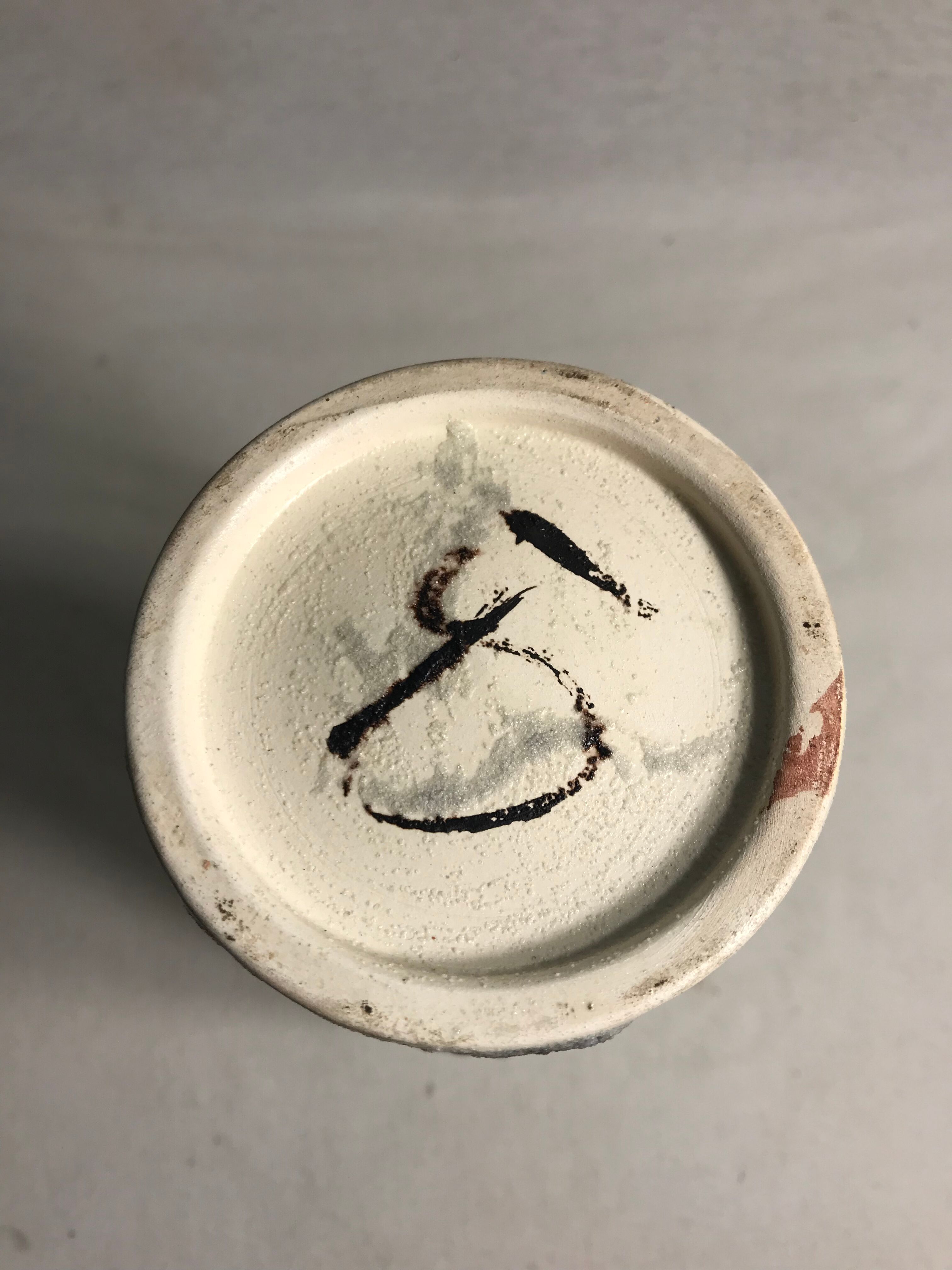 Roll old glazed ceramic vase green