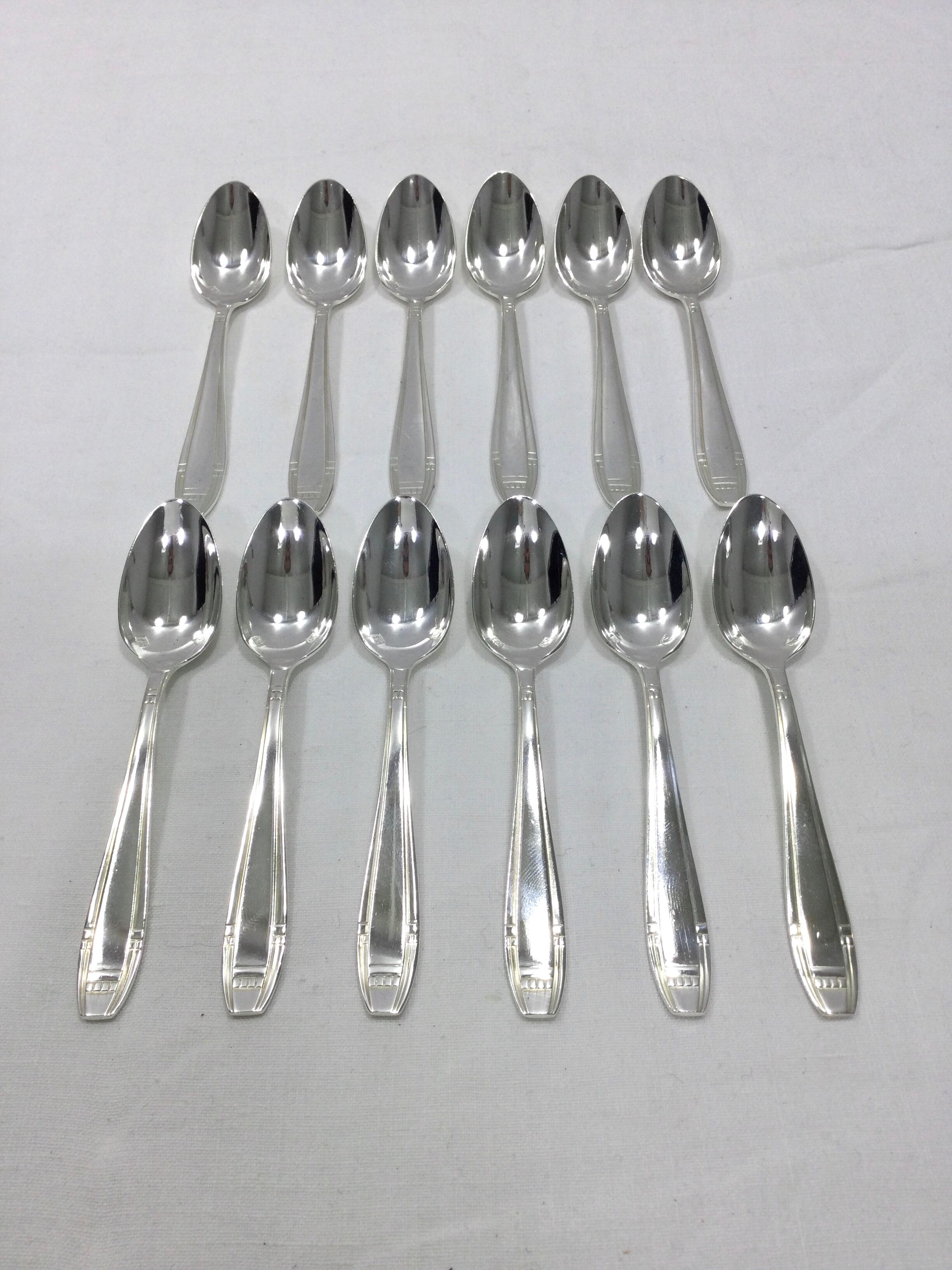 12 art deco mocha spoons made of silver metal
