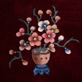 China wool fringed rug with floral pattern on deep plum background 393x274cm