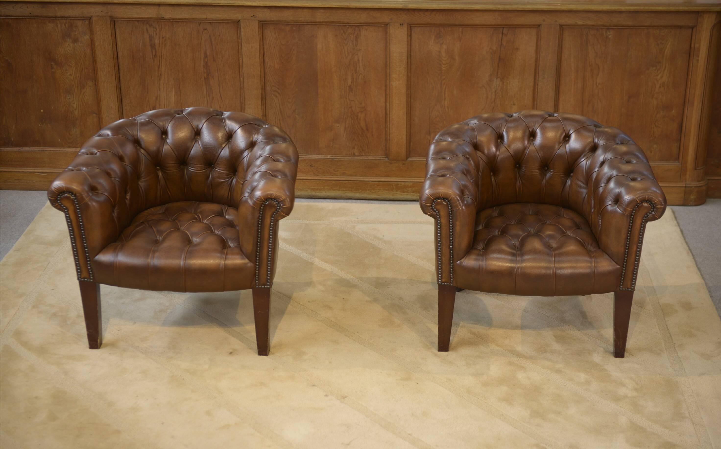 Pair of upholstered leather Club armchairs