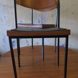 Pair of teak and iron stacking chairs, 1960s
