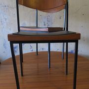 Pair of teak and iron stacking chairs, 1960s