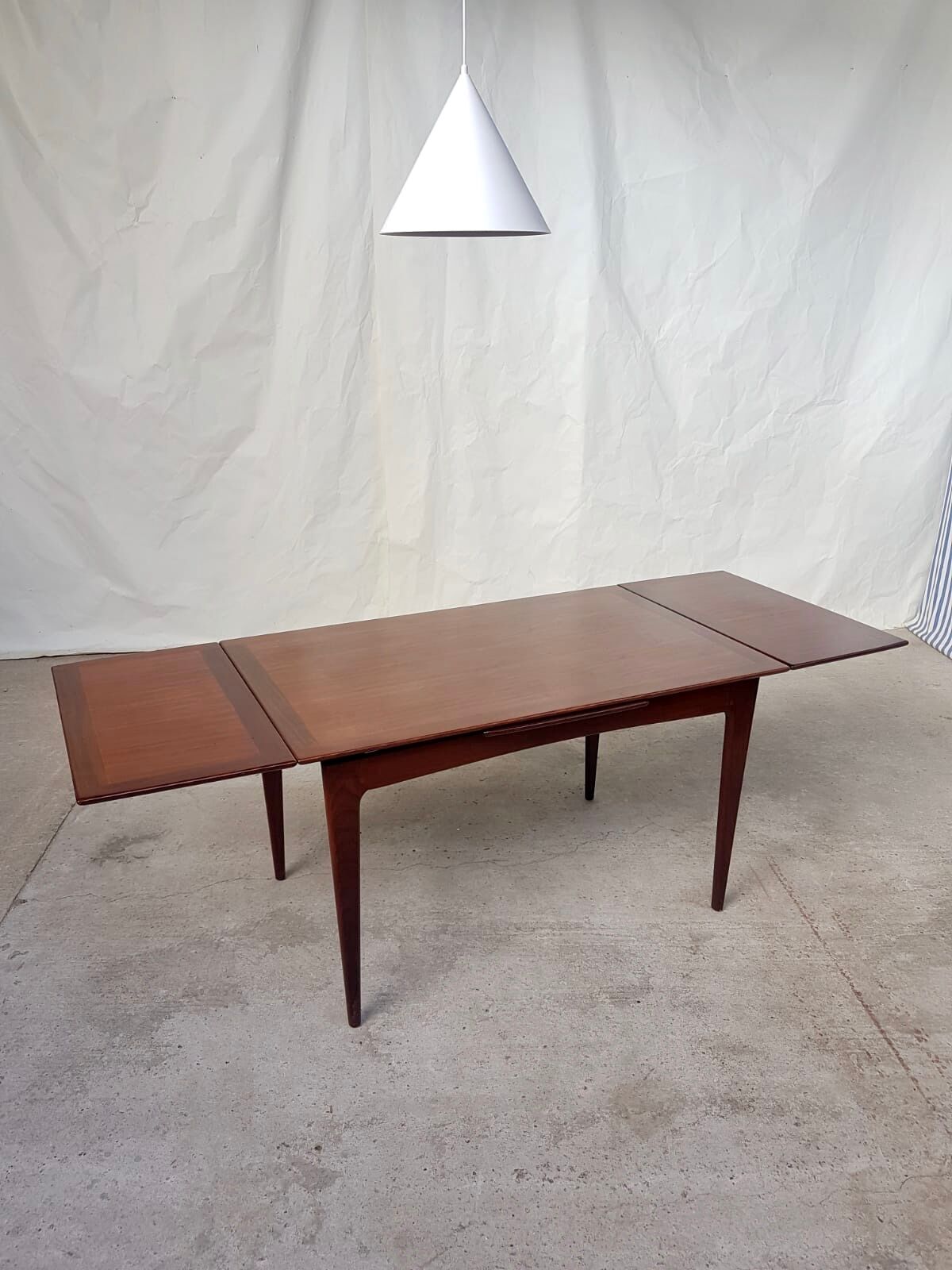 Teak extending dining table by Younger