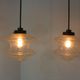 Set of two glass pendant lighting designed by Raak Holland