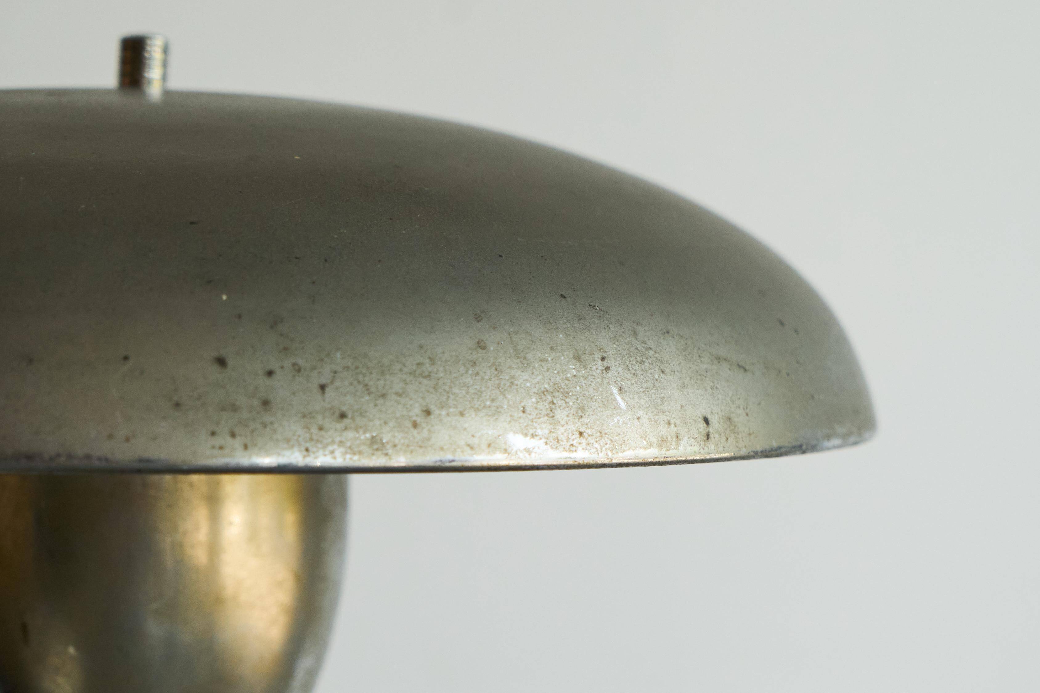 Patinated brass and chrome table lamp from the 1950s.