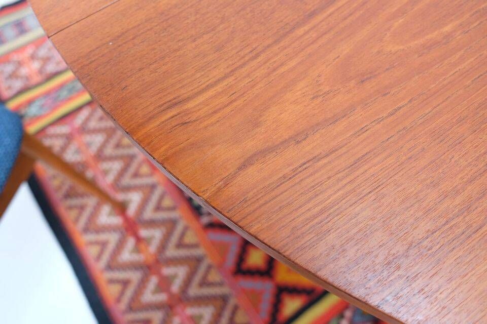 1960s/70s-style teak dining table by ASKO, with a retro vintage design.