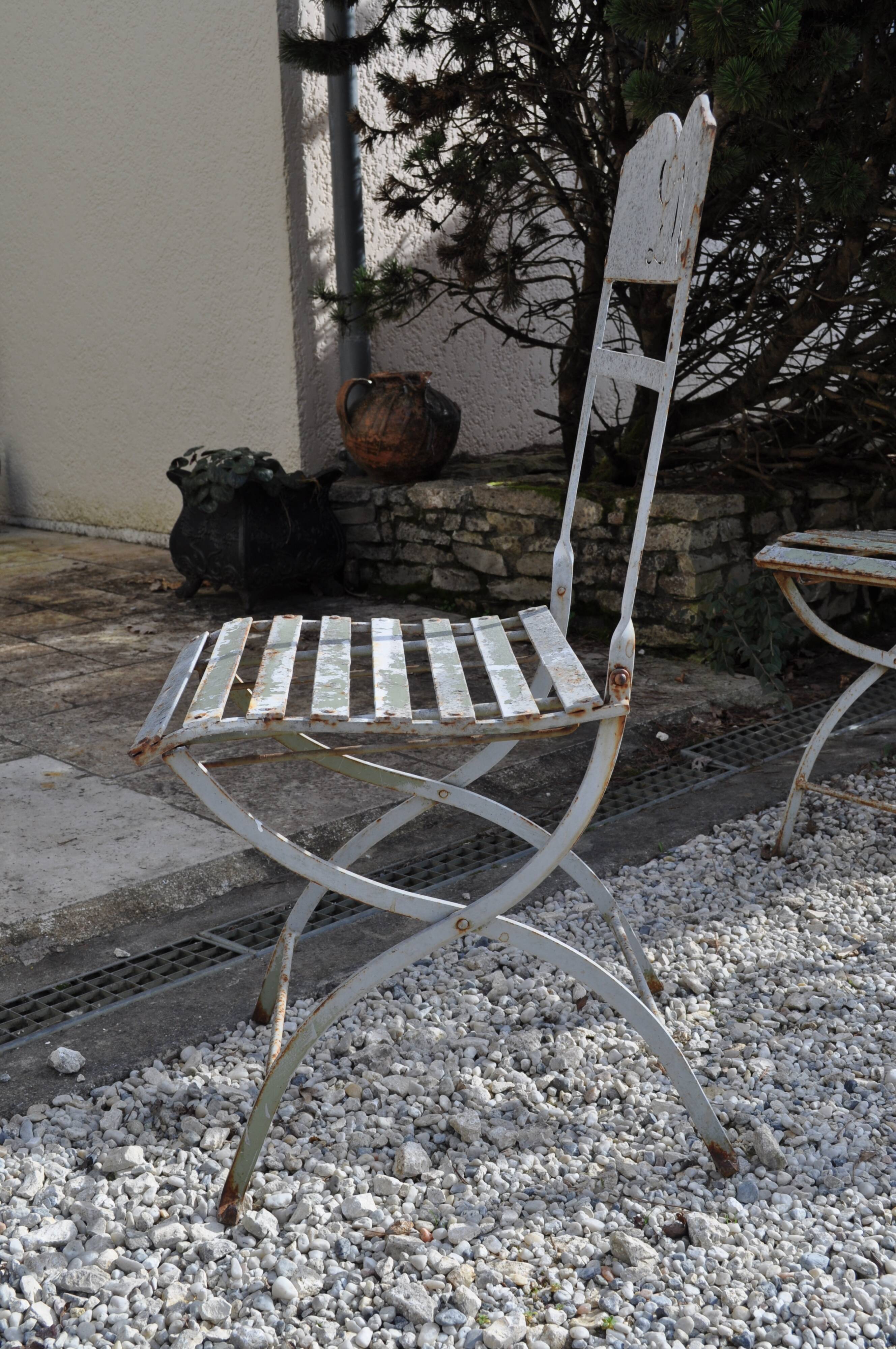 L M monogrammed metal garden chairs