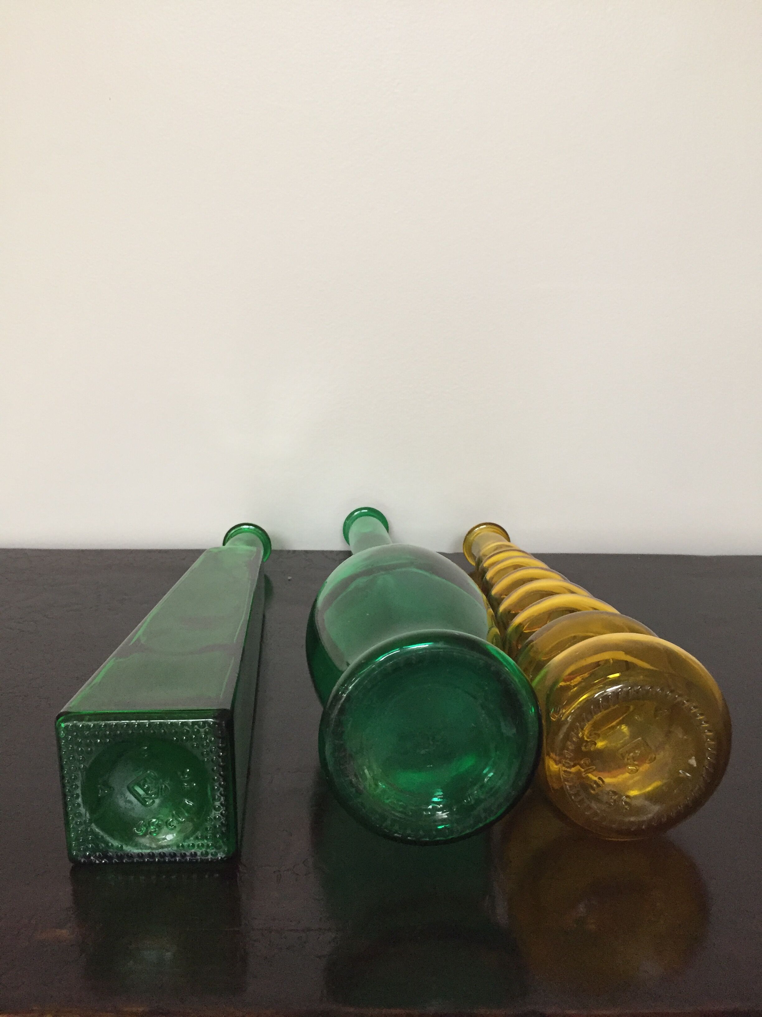 Series of 3 green and yellow glass vases