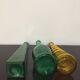 Series of 3 green and yellow glass vases