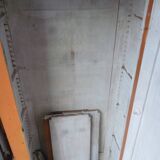 Small piece of furniture with orange patina