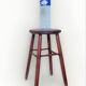 Vintage four-legged stool made of solid wood from the 1970s/80s.