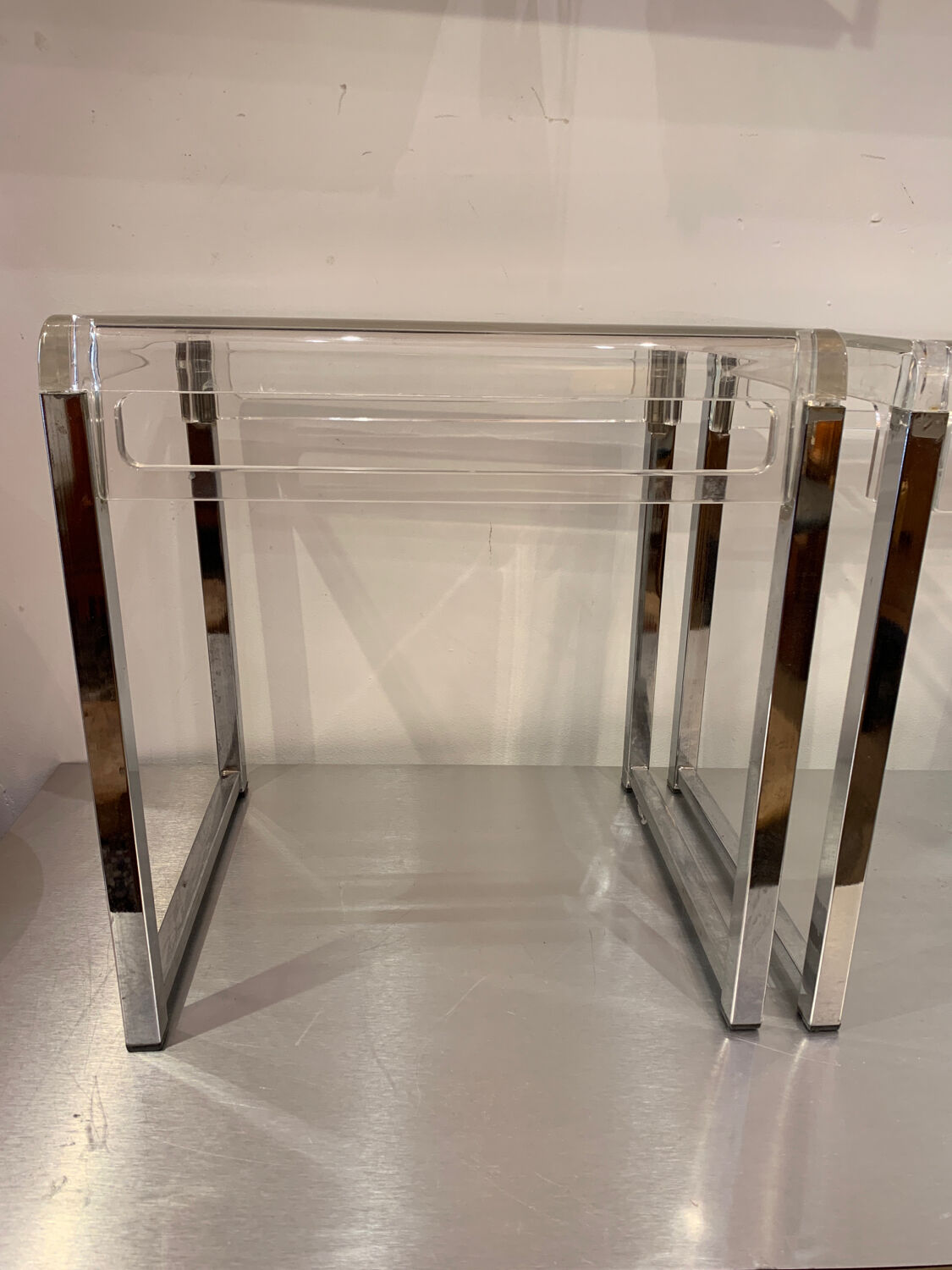 Pair of vintage chrome and acrylic glass bedside tables