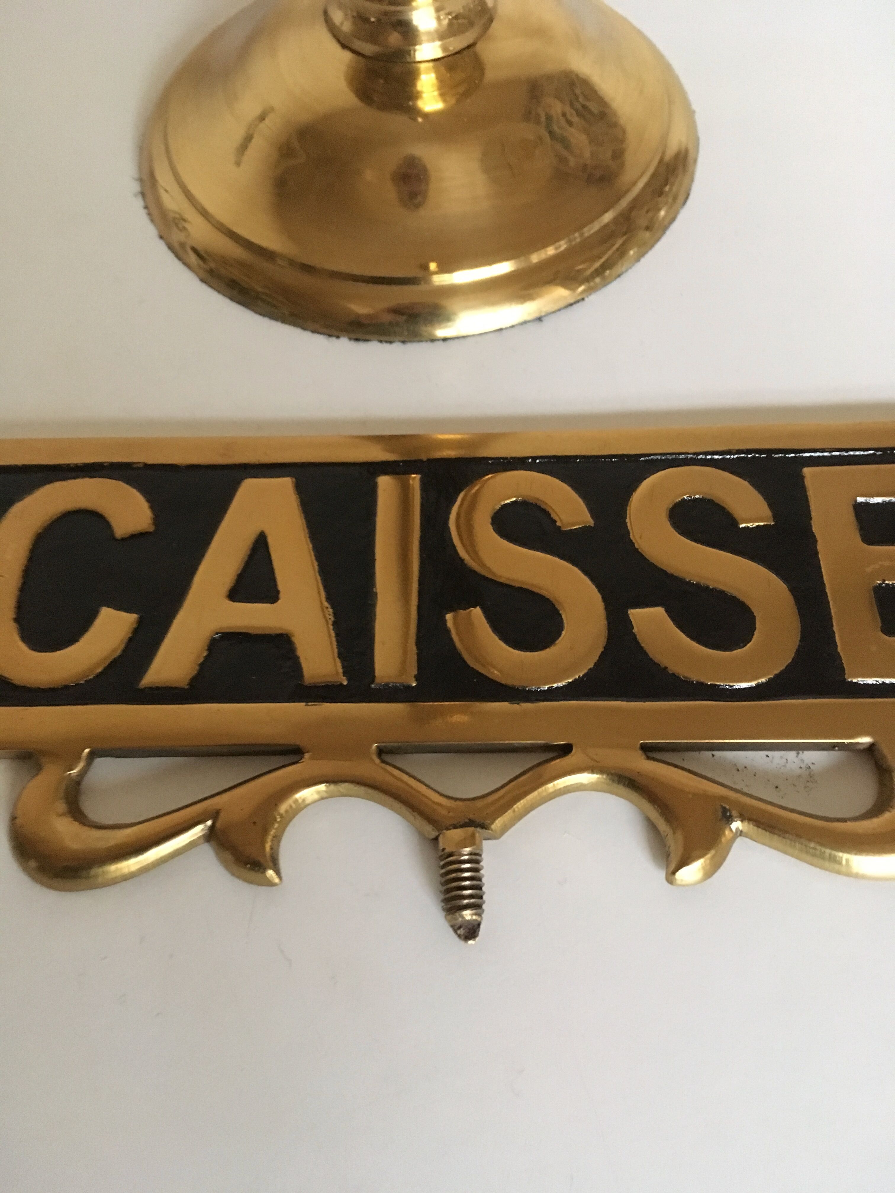 Brass palace brasserie counter plate on foot