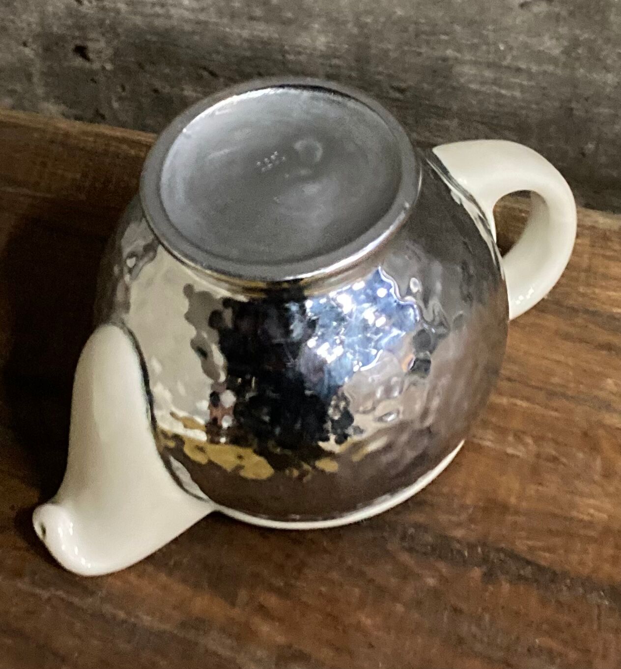Ceramic/tinned milk jug.
