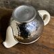 Ceramic/tinned milk jug.