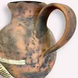 Handcrafted pottery pitcher from the 50s
