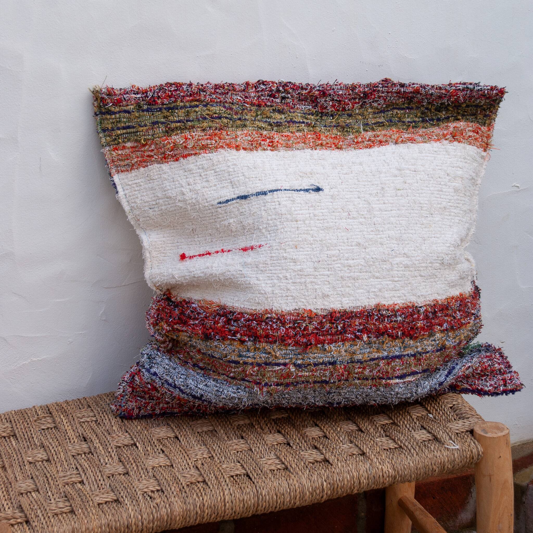 Handwoven cushion cover made from recycled cotton