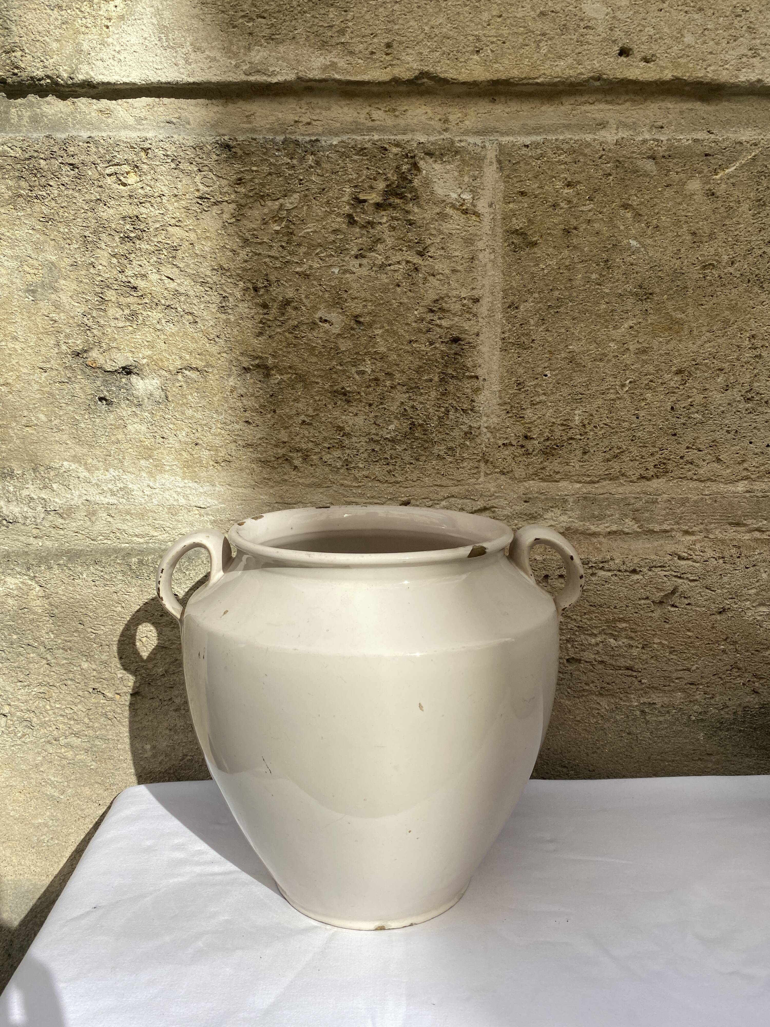 Enamelled terracotta pot