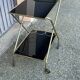 Vintage gold dessert bar with two black trays.