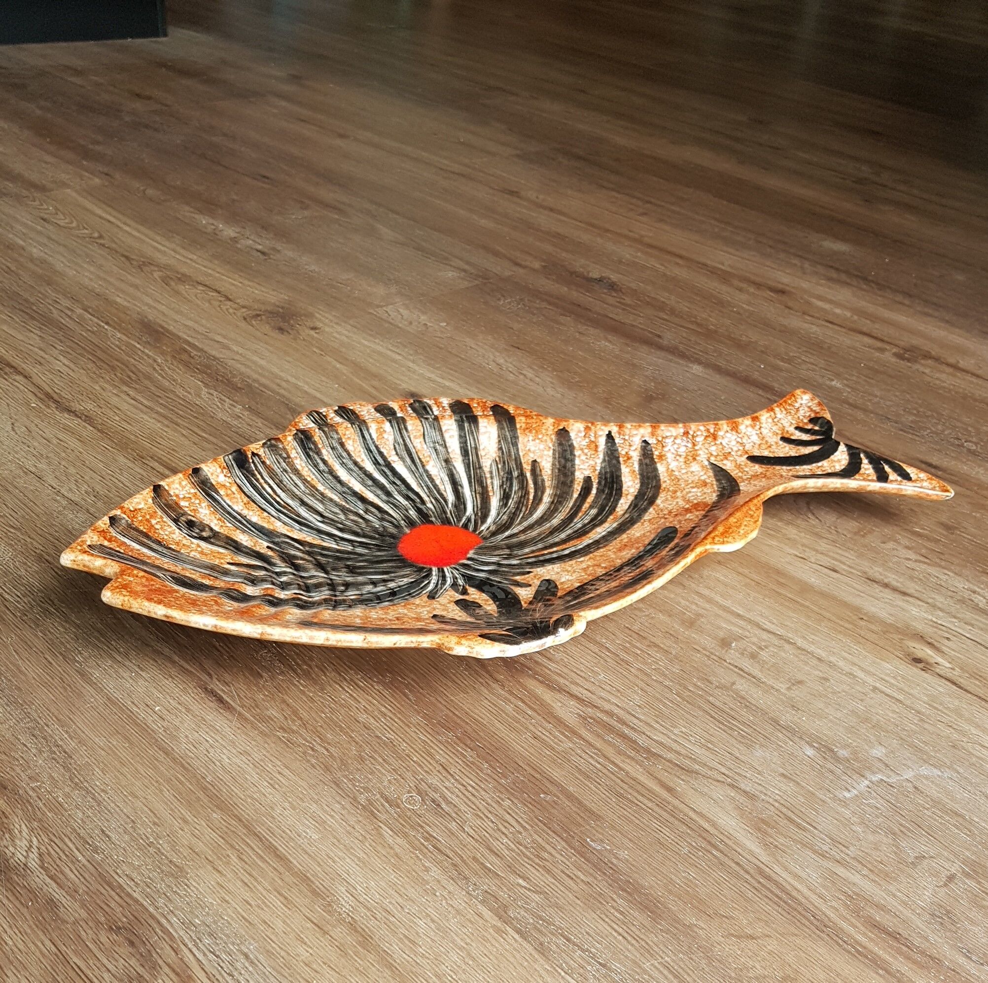 Ceramic dish in the shape of a fish.