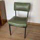 green and metal skai chair