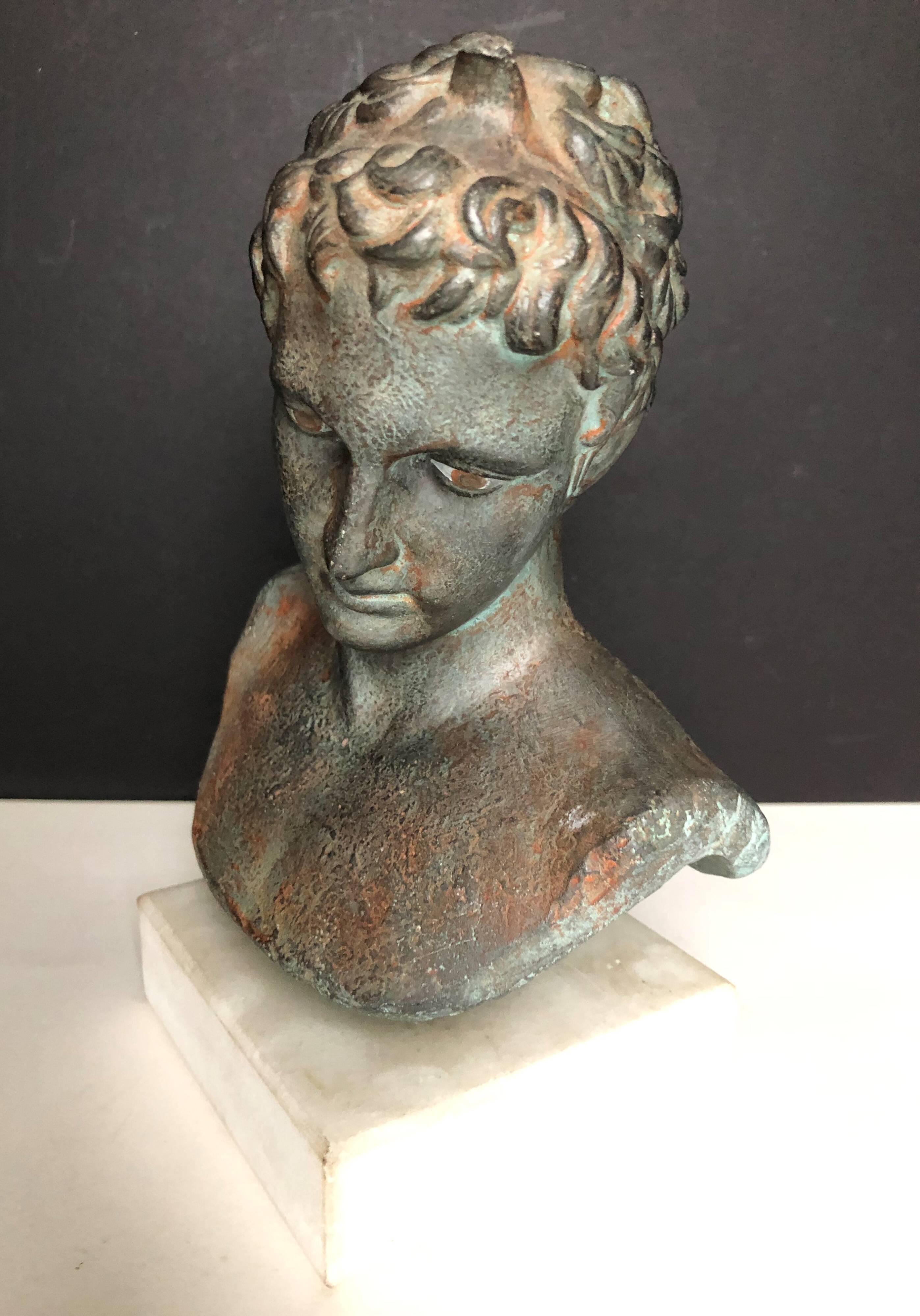 Greek bust in terracotta with bronze patina