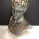 Greek bust in terracotta with bronze patina