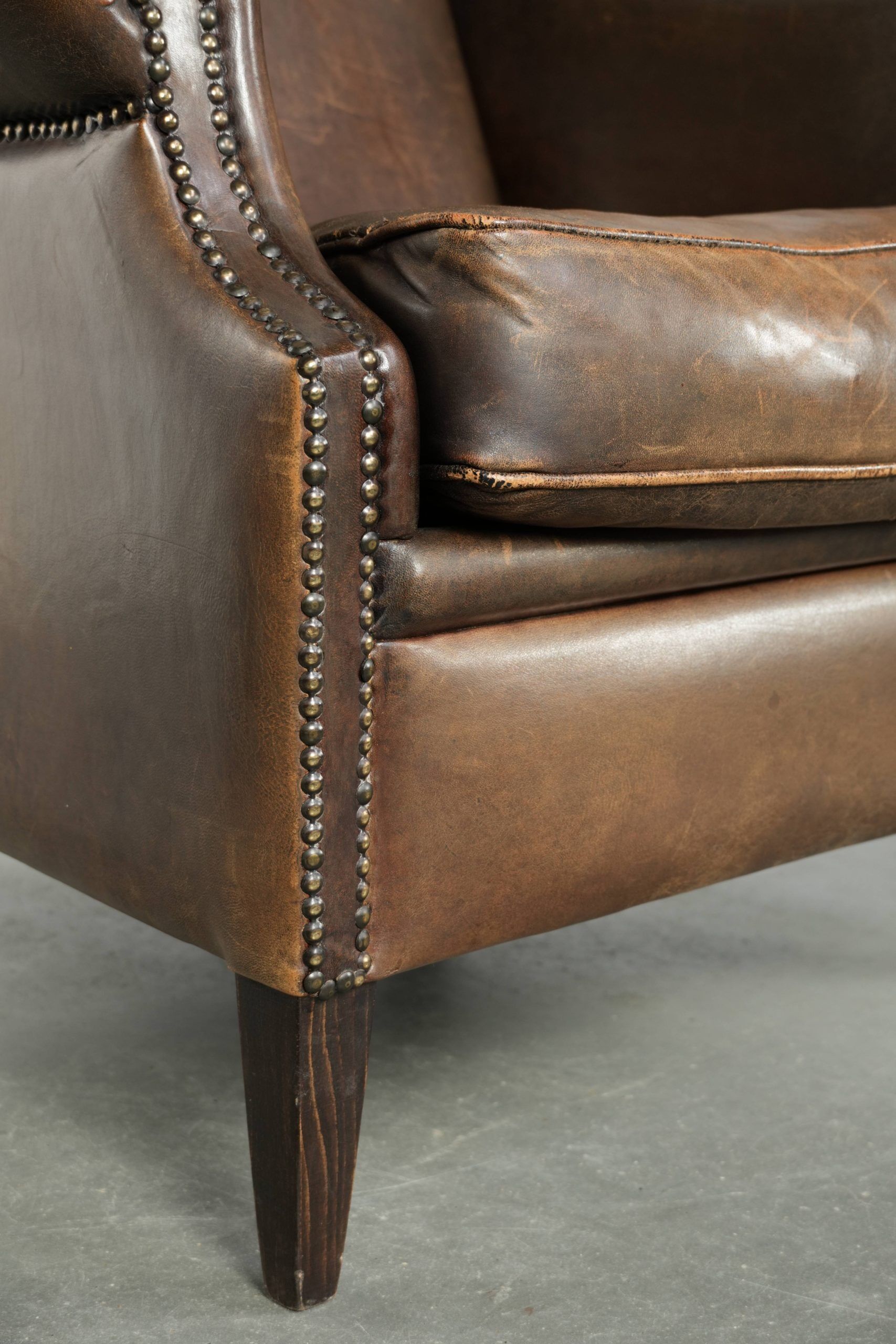 Large sheepskin wingback armchair with beautiful warm colours