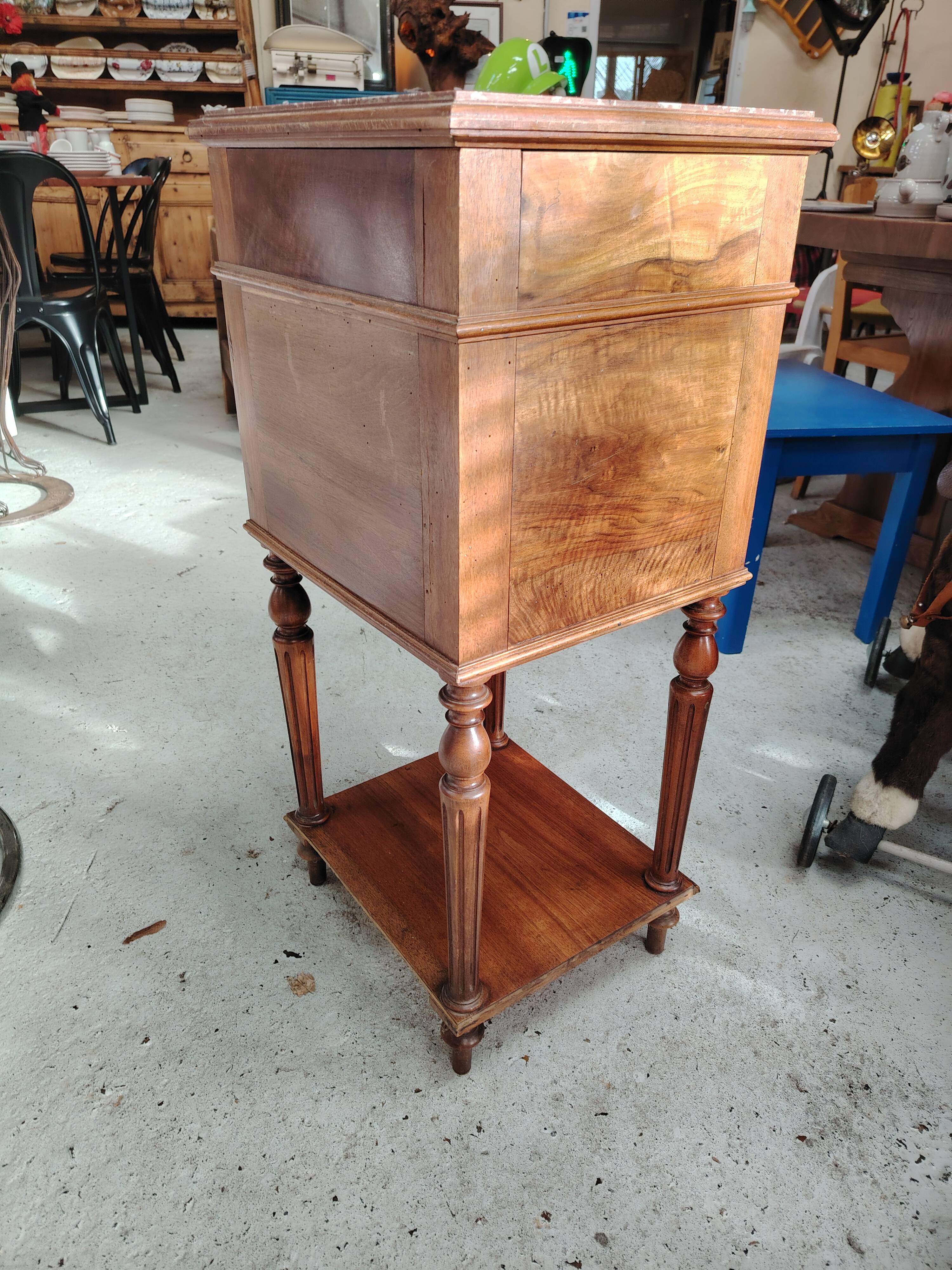 Beautiful antique nightstand in walnut with a marble top from the late 19th century.
