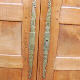 Louis Philippe wardrobe in golden cherry wood from the 19th century.