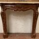 Fireplace three shells louis XV style in royal red marble XIX century