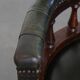 Adjustable green leather and wood Chesterfield office chair with swivel