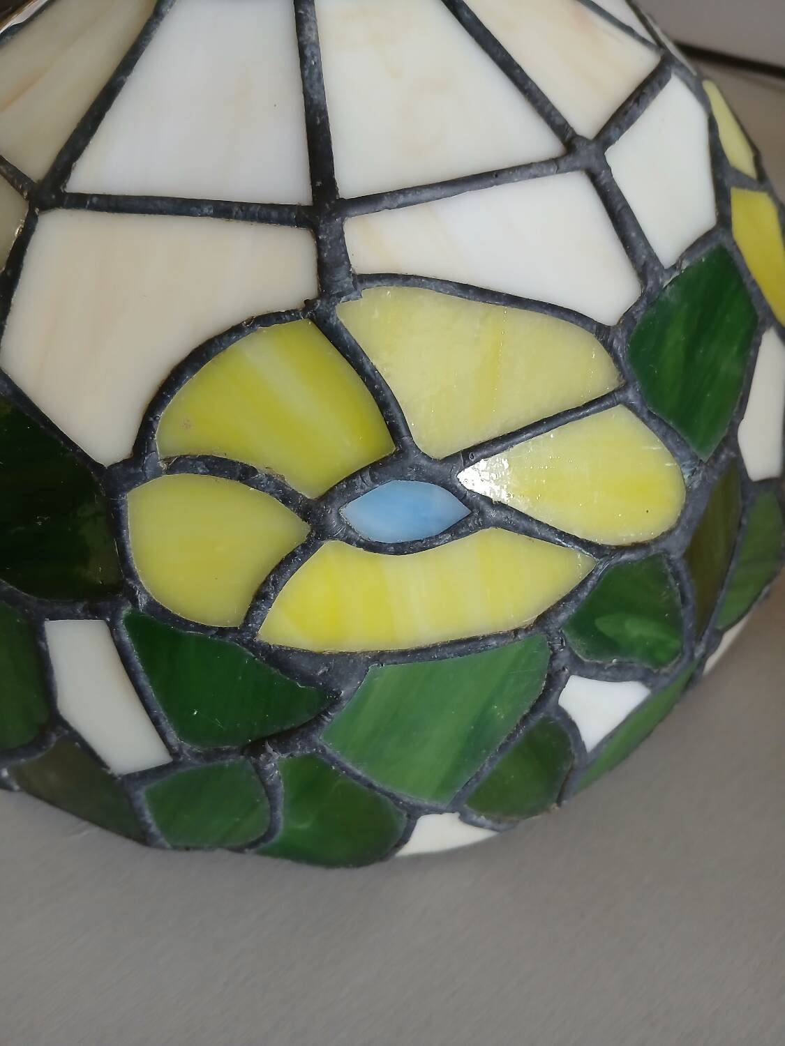 Antique stained glass and tin pendant light