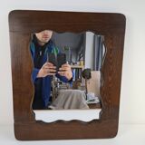 Czechoslovakian wall mirror with a wavy wooden frame, mid-century, 1940s