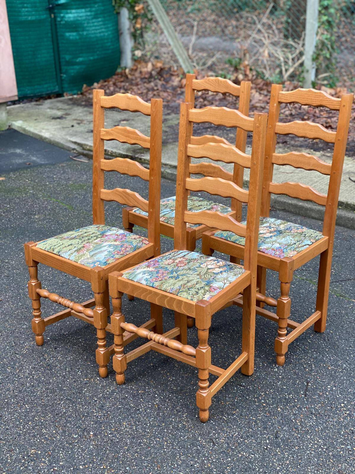 4 solid wood chairs with embroidered fabric
