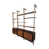 Étagères murale bois, inox et verre Roche Bobois