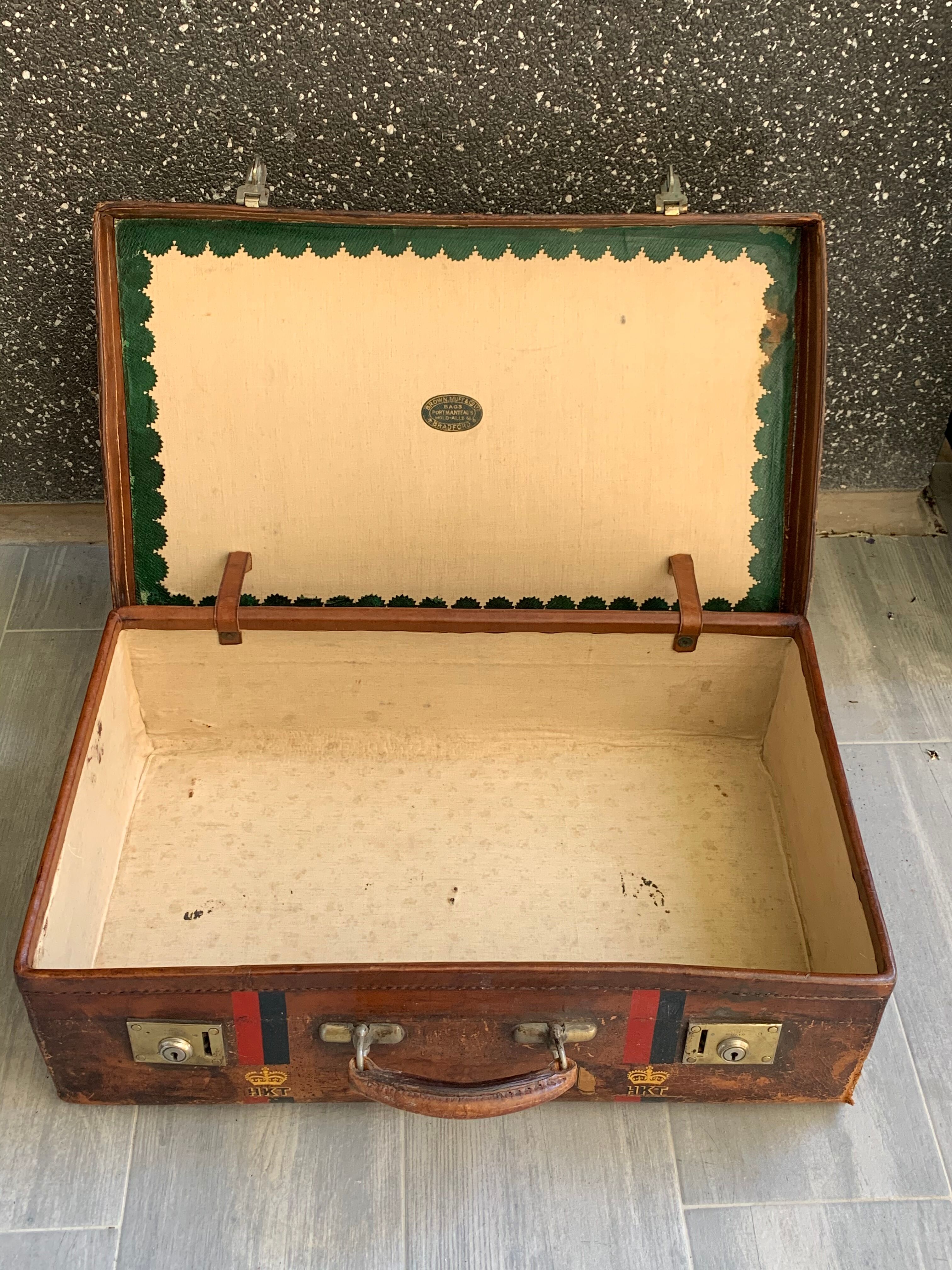 Rare old English suitcase stamped with the royal crown