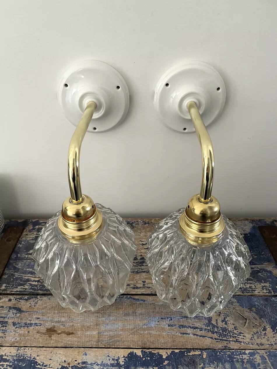 Pair of chiseled glass wall sconces